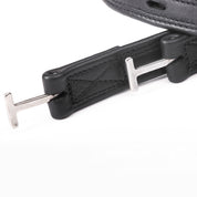 Close-up view of the T-piece on the black Kavalkade Oiled Dressage Stirrup Leathers on a white background