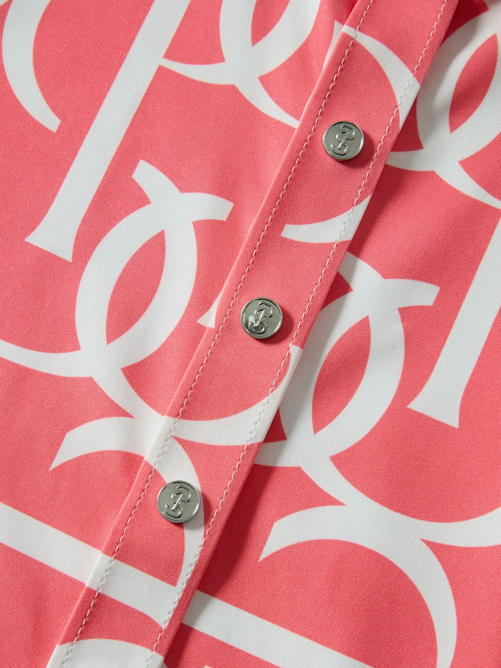 Close-up front view of the buttons on the Pink Guava PS of Sweden Valerie Printed Long Sleeve Shirt