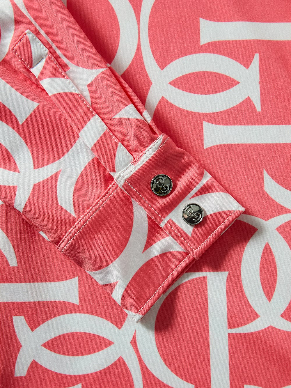 Close-up front view of the sleeve cuff and buttons on the Pink Guava PS of Sweden Valerie Printed Long Sleeve Shirt