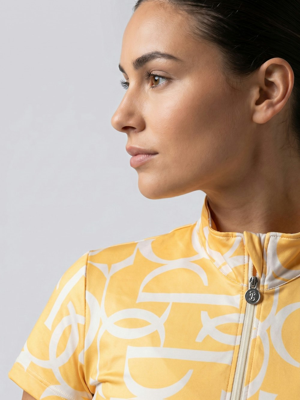 Front view of a model wearing the sunburst sorbet PS of Sweden Vera Printed Short Sleeve Top on a plain background
