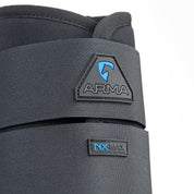 Close-up of Shires Equestrian ARMA NX-MAX brushing boot showing ARMA logo and NX-MAX label
