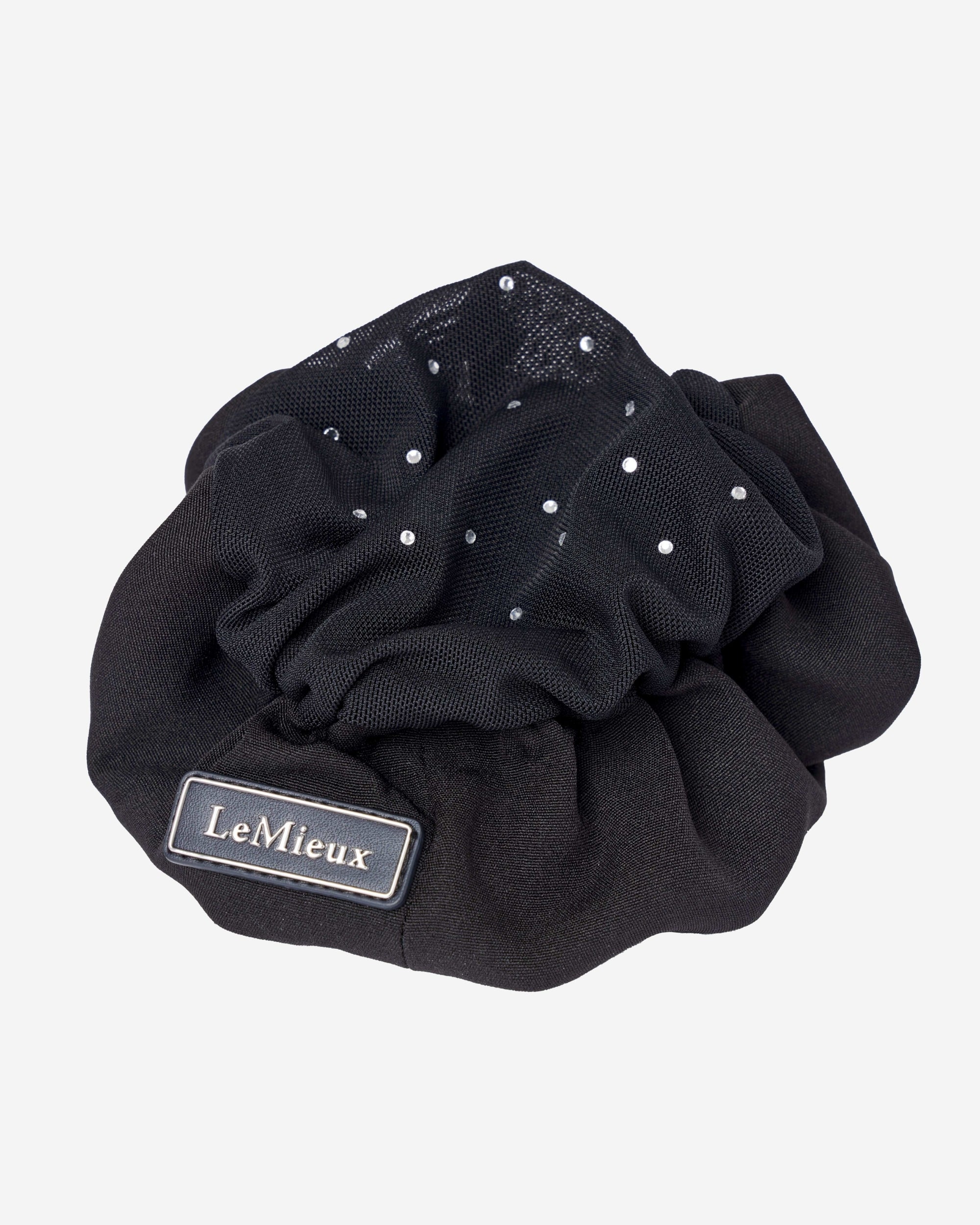 Top view of the black LeMieux Scrunchie With Crystal Hair Net on a plain background