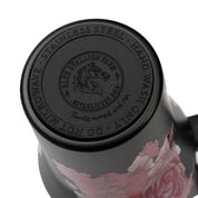 Bottom view of the black floral bouquet Blue Stallion Farm 40 oz Tumbler on a white background