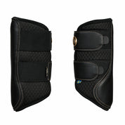 Side-by-side views of the black Back on Track Deep Nights Brush Boots on a white background