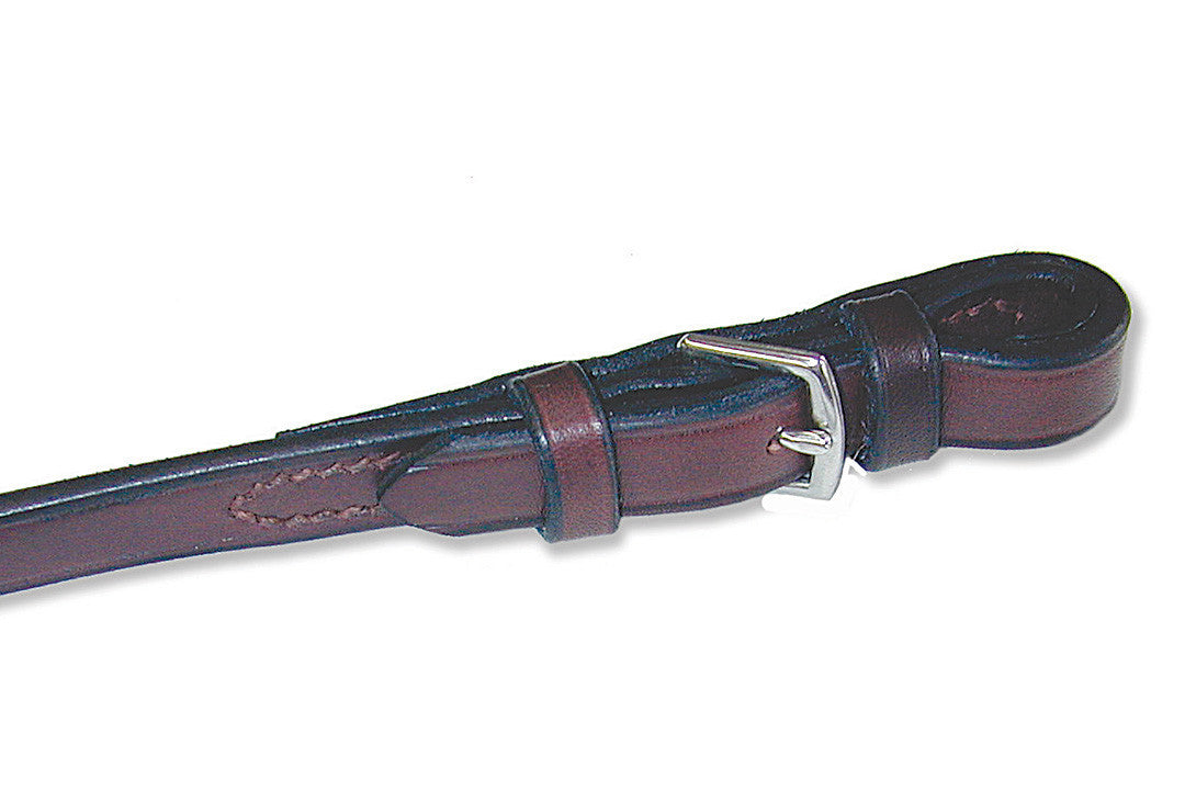 Close-up view of the bucle end on the havana Nunn Finer Rubber Reins on a white background