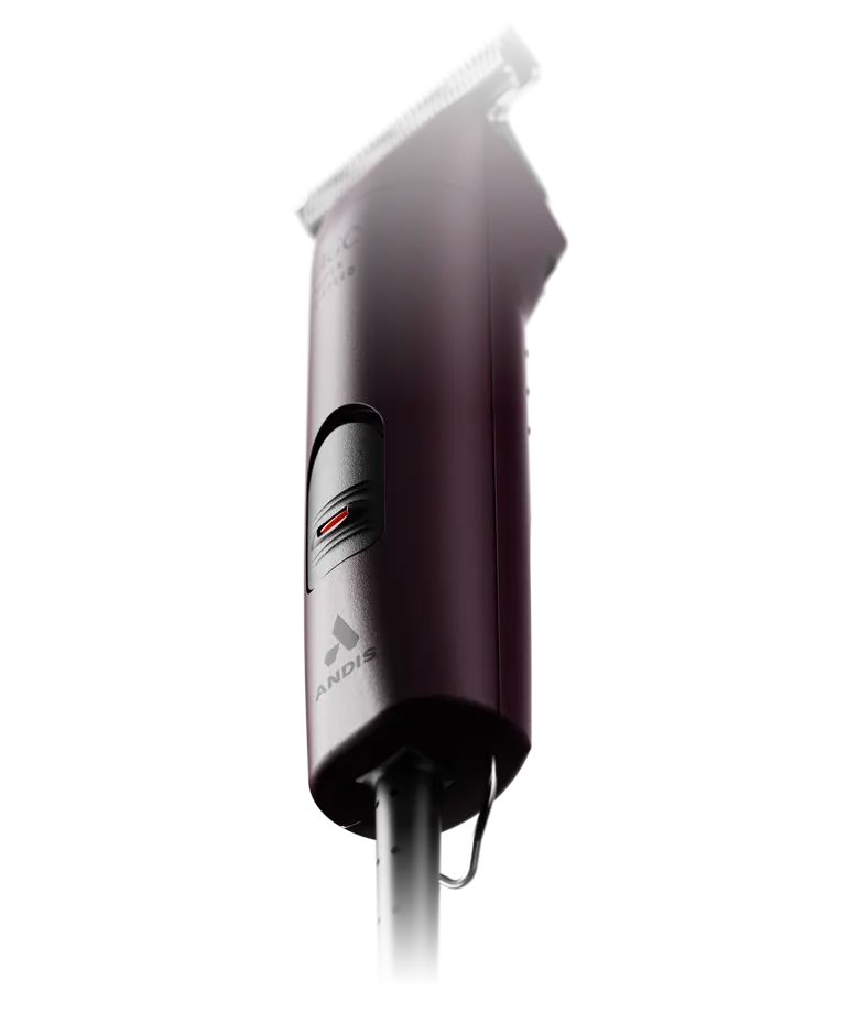 Close-up bottom view of a purple pair of Andis AGC Super 2-Speed Clippers on a white background