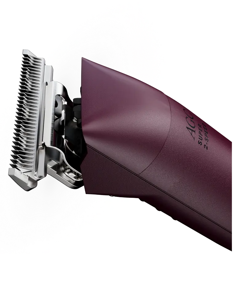 Close-up side view of a purple pair of Andis AGC Super 2-Speed Clippers on a white background