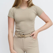 Front view of a female model wearing the Cairo TKEQ Kennedy Seamless Short Sleeve Shirt 2.0 on a white background
