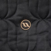 Close-up view of the Back on Track logo on the Back on Track Deep Nights All-Purpose Saddle Pad