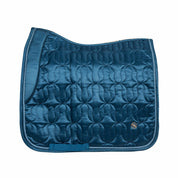 Side view of the blueberry Back on Track Deep Nights Dressage Saddle Pad on a white background