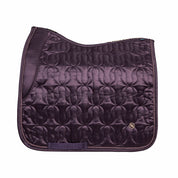Side view of the plum Back on Track Deep Nights Dressage Saddle Pad on a white background