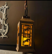 Side view of the jumping All Designs Equine Horse Lantern hanging on a brown wall