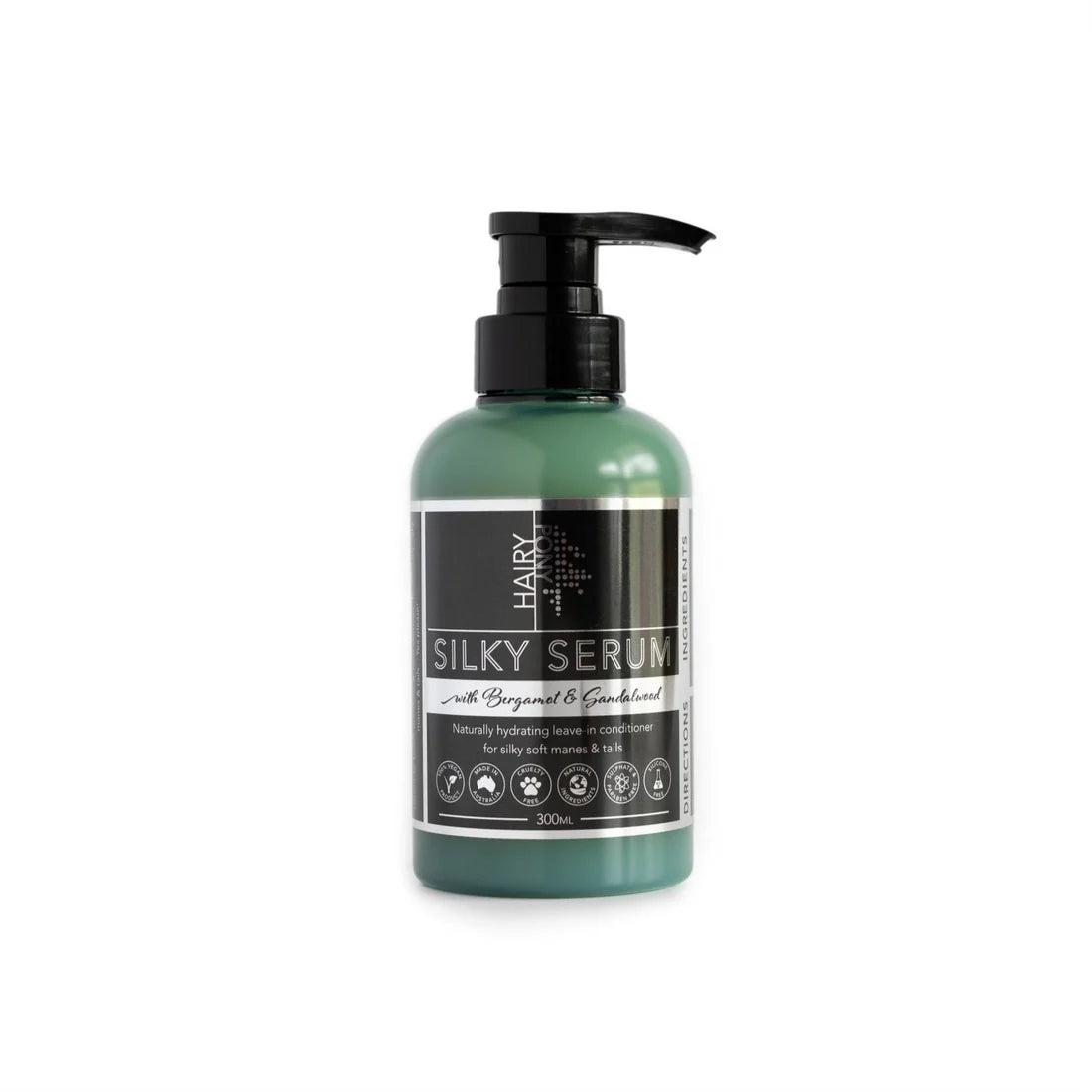 Bottle of Hairy Pony Silky Serum with pump dispenser on white background