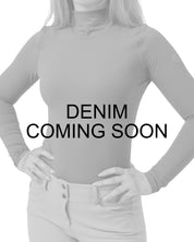 Coming Soon Infographic of a female model wearing the Denim TKEQ Chloe High Collar Technical Top on a plain background