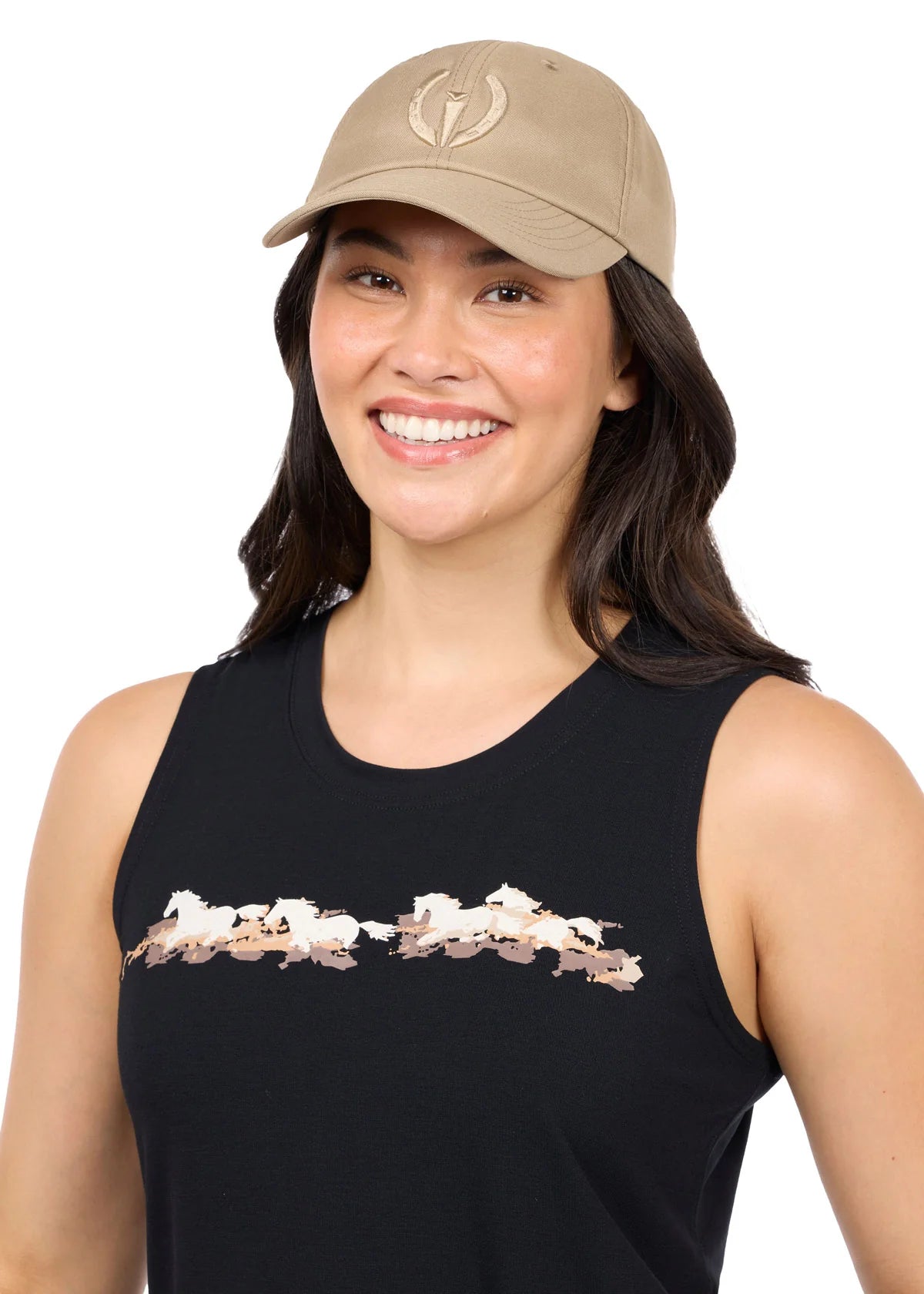 Model wearing the Kerrits Logo Baseball Hat in tan on a white background