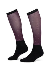 View of a pair of Elderberry Lucky Dots Kerrits Dual Zone Boot Socks on a white background