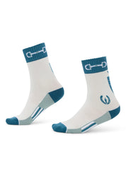 White paddock socks with teal accents worn on feet