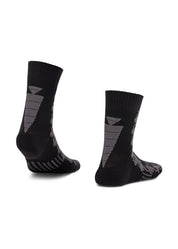 Back views of a pair of black Kerrits Houndstooth Wool Paddock Boot Socks on a white background