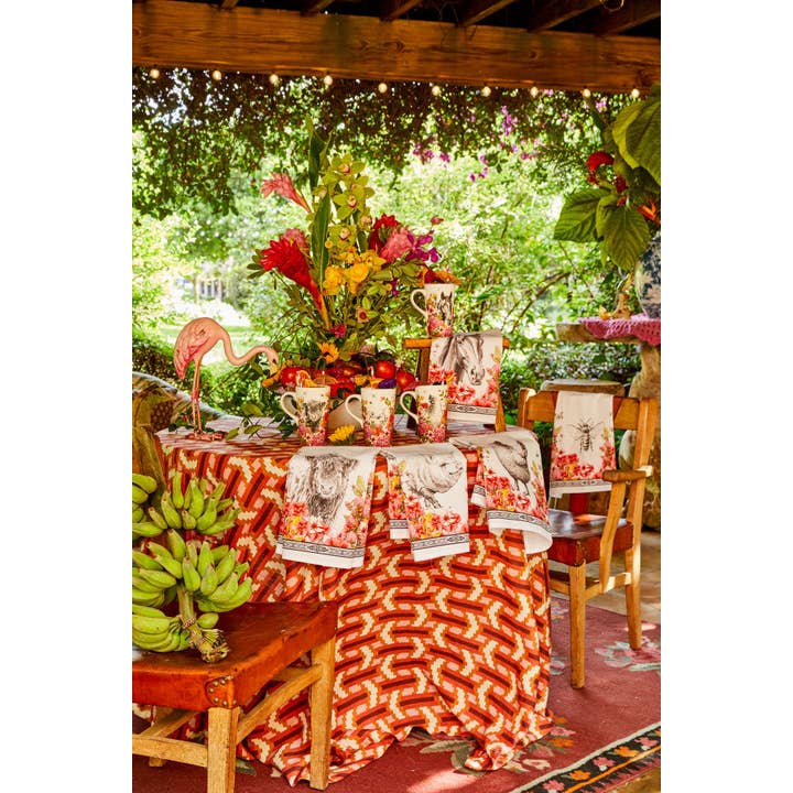 View of a vibrant Blue Stallion Farm tablescape which includes the floral Rocky Blue Stallion Farm Rocky Tea Towel