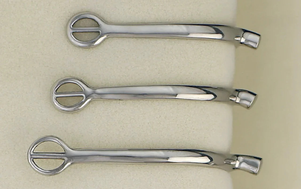 Side view of 3 different sized Centaur Stainless Steel Tom Thumb Spurs on a plain background