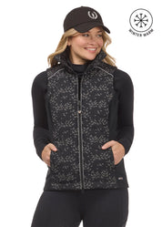 Front view of a model wearing the Black Happy Herds Kerrits Horse Reflection Quilted Vest on a white background