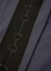 Close-up view of the bit pattern on the sleeve of the Carbon Kerrits Bit of Base Layer Top