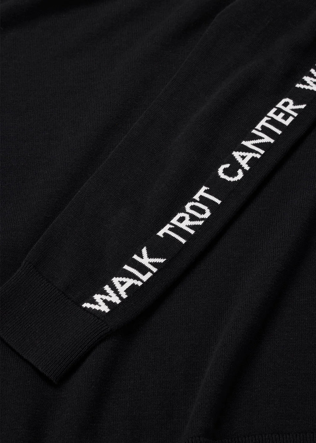Close-up view of the Black/White Kerrits Equi Rhythm Crew Neck Sweater