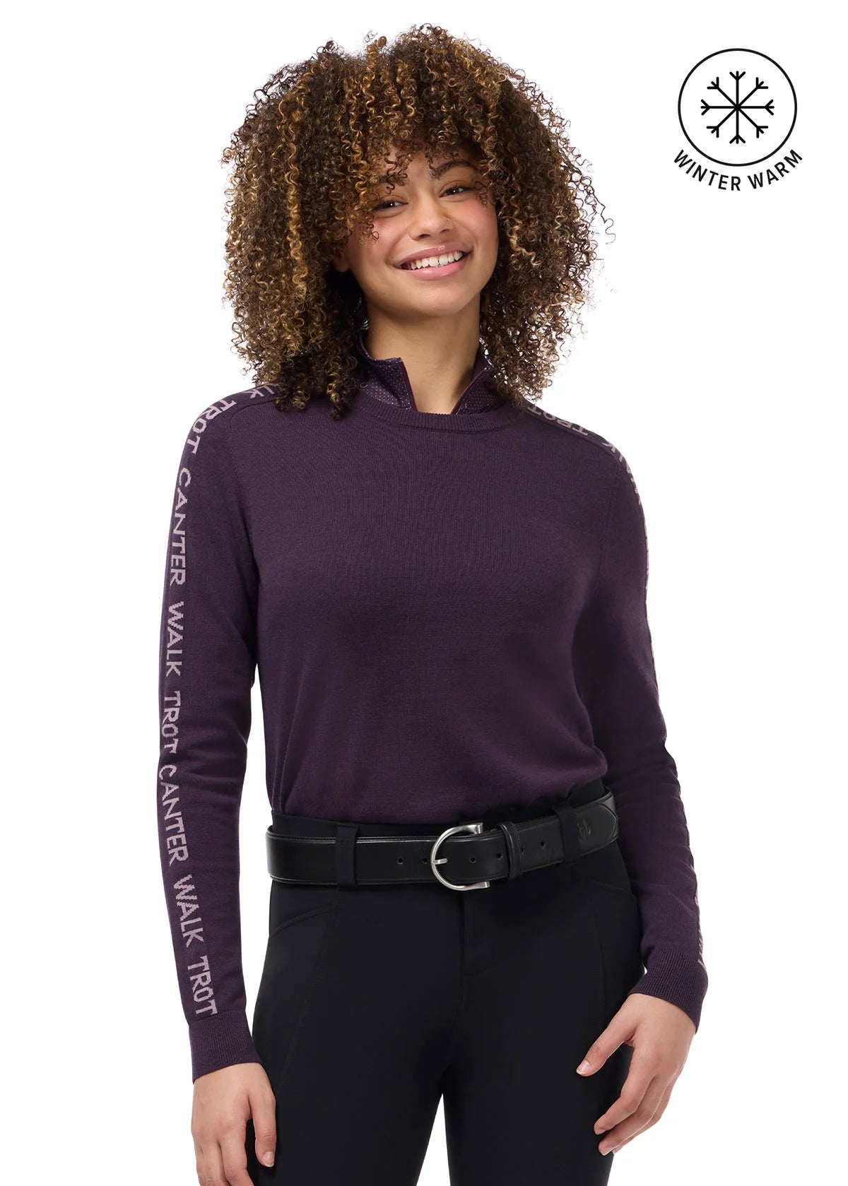 Front view of a female model wearing the Elderberry/Sugarplum Kerrits Equi Rhythm Crew Neck Sweater on a plain background