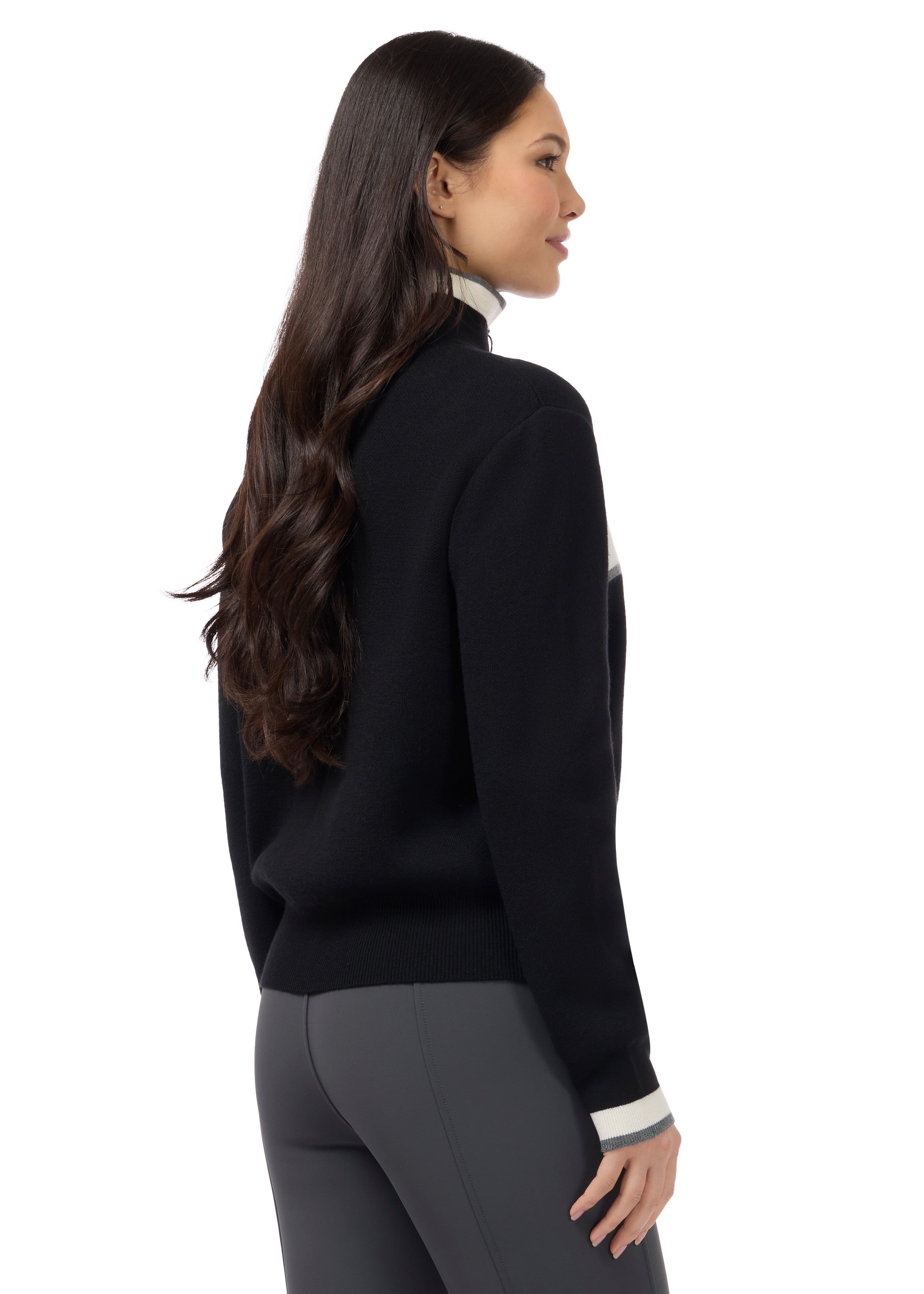 Angled back view of a model wearing Black Kerrits Reflections Full Zip Sweater on a white background