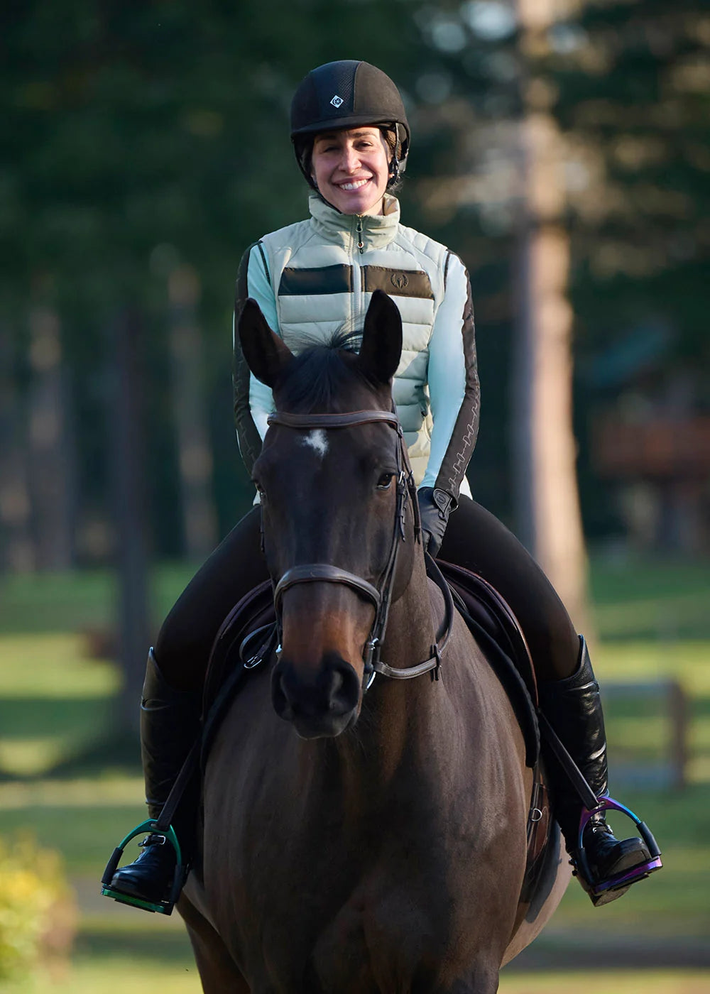 Front view of a model wearing Shoreline Kerrits All Trek Performance Quilted Vest