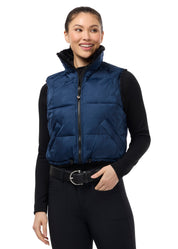 Front view of a model wearing Nightfall Kerrits Skyline Houndstooth Reversible Vest on a white background