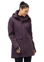 Front view of a model wearing Elderberry Kerrits Weatherlock Three-Quarter Length Jacket on white background
