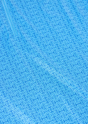 Close-up of blue patterned fabric on sleeveless riding shirt
