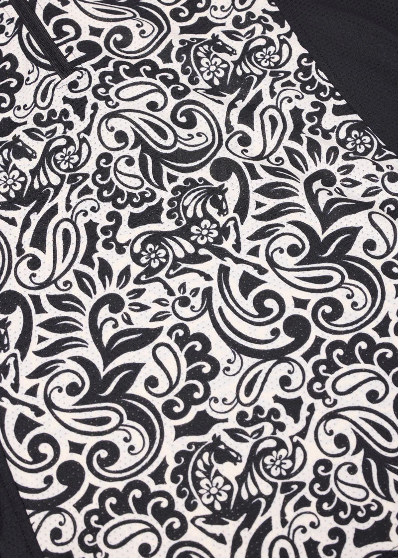 Close-up of black and white patterned fabric on shirt