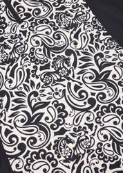 Close-up of black and white patterned fabric on shirt