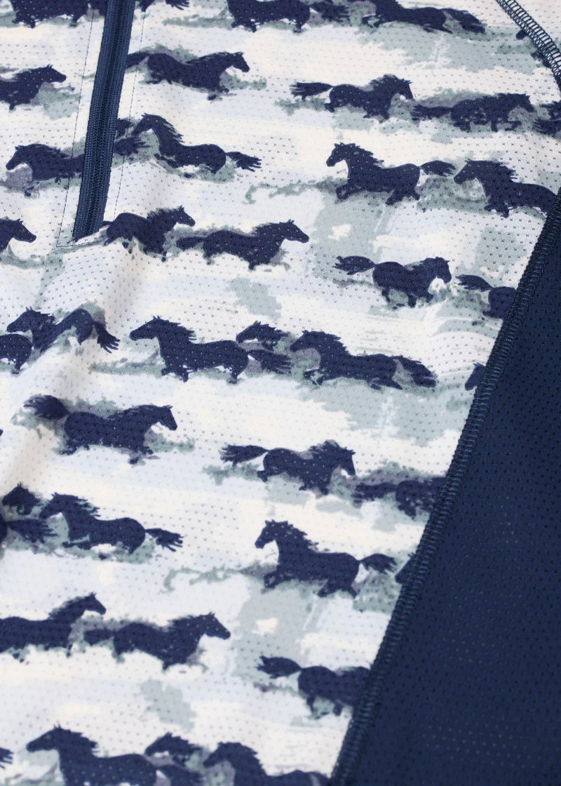 Close-up of horse print fabric on riding shirt