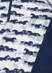 Close-up of horse print fabric on riding shirt