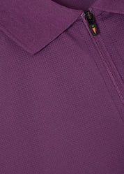 Close-up view of the zipper on the purple Kerrits Serenity Coolcore Short Sleeve Polo