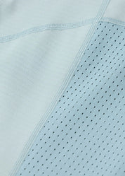 Close-up view of the fabric on the light blue Kerrits Precision Long Sleeve Crew Neck Tech Top