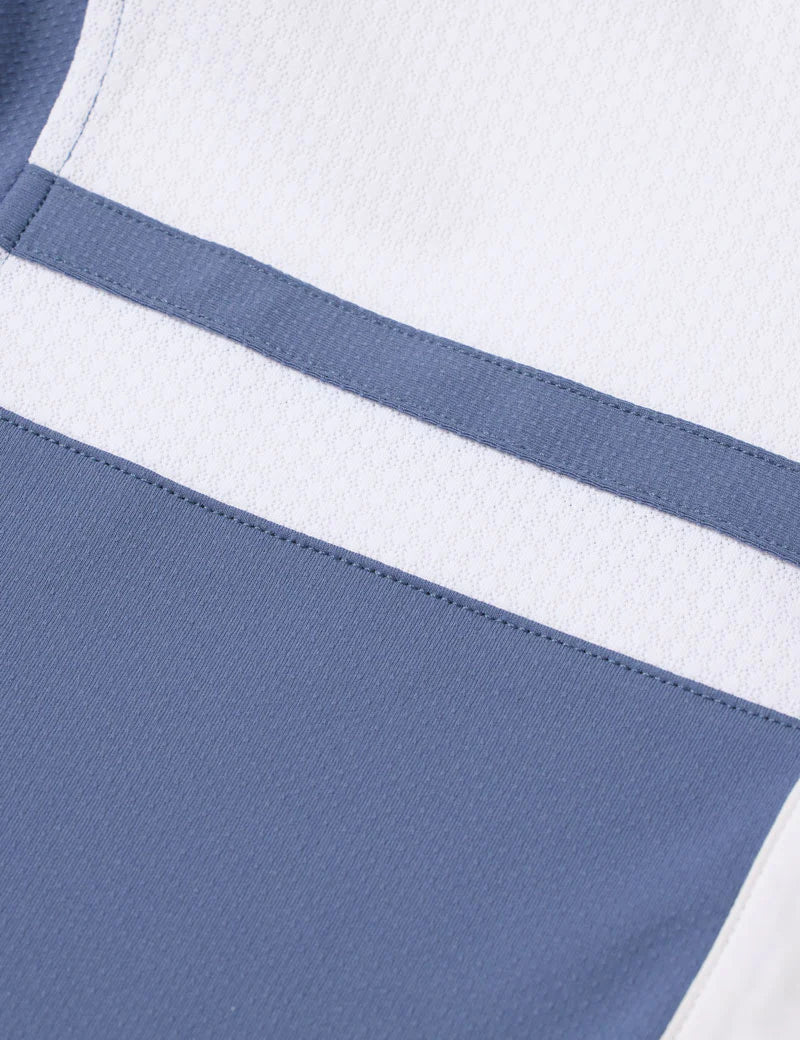 Close-up of light blue fabric with white stripe detail