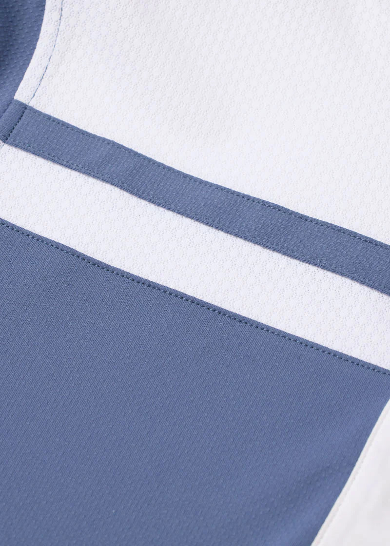 Close-up of light blue fabric with white stripe detail