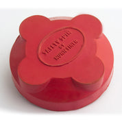 View of the red Nunn Finer Safety Spin Tap on a white background