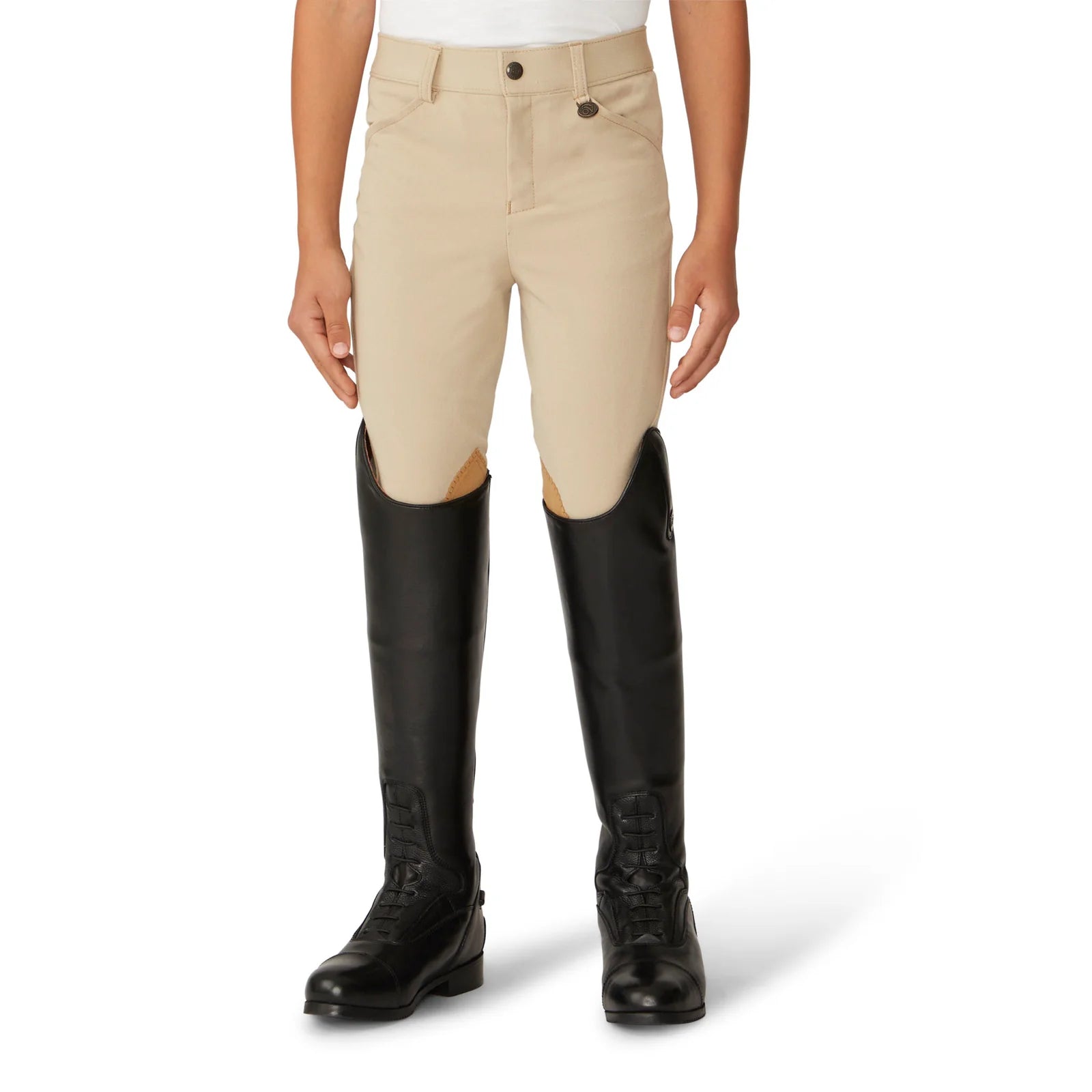 Front view of a model wearing the tan Ovation Boys Classic 4-Pocket Suede Knee Patch Breech with black tall boots on a white background