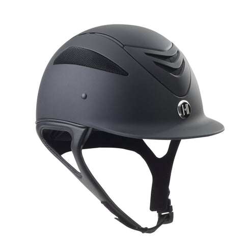 Angled front view of the black matte One K Defender Helmet on a white background