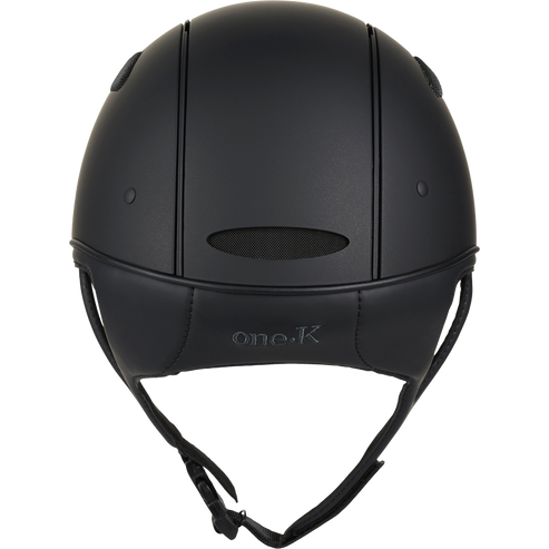 Back view of the black matte One K Defender Helmet on a white background
