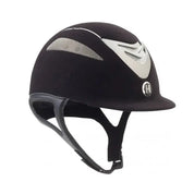 Angled front view of the black matte chrome stripe One K Defender Suede Helmet on a white background
