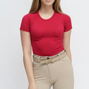 Front view of a female model wearing the Sour Cherry TKEQ Kennedy Seamless Short Sleeve Shirt 2.0 on a white background
