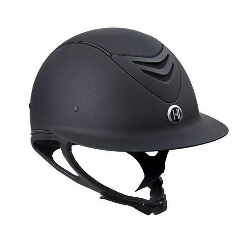 Angled front view of the black matte One K Defender AVANCE Wide Brim Defender Helmet on a white background