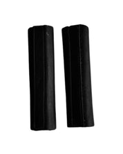 View of a pair of black DziaSport Eyes Forward Removable Leather Blinkers on a white background