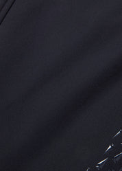Close-up view of the black Kerrits 3-Season Tailored Knee Patch Breech on a white background